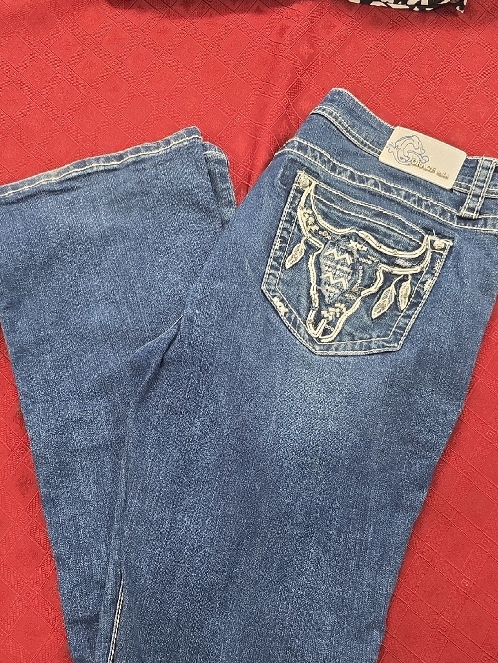 Grace in LA Blue Boot Cut Jeans with Embroidered Bull Skull Pocket